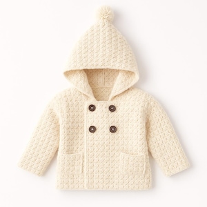 May include: Cream-colored baby coat with a hood and pom-pom detail. The coat features a textured knit pattern, a double-breasted closure with four brown buttons, and two front pockets. A cozy outerwear garment for infants.