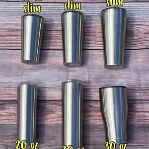 May include: Six stainless steel tumblers in various sizes and styles. The tumblers are labeled with their size and style, including 16 oz slim, 22 oz slim, 32 oz slim, 20 oz skinny, 30 oz skinny, and 30 oz curve.