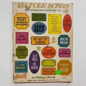 May include: A vintage book cover featuring a collection of 124 folk songs, with illustrations of various folk musicians, including Woody Guthrie, Pete Seeger, and Oscar Brand. The book cover is yellow with red, blue, and green accents.