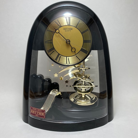 Vintage 1980s Rhythm Quartz Celestial Motion Clock With Spinning
