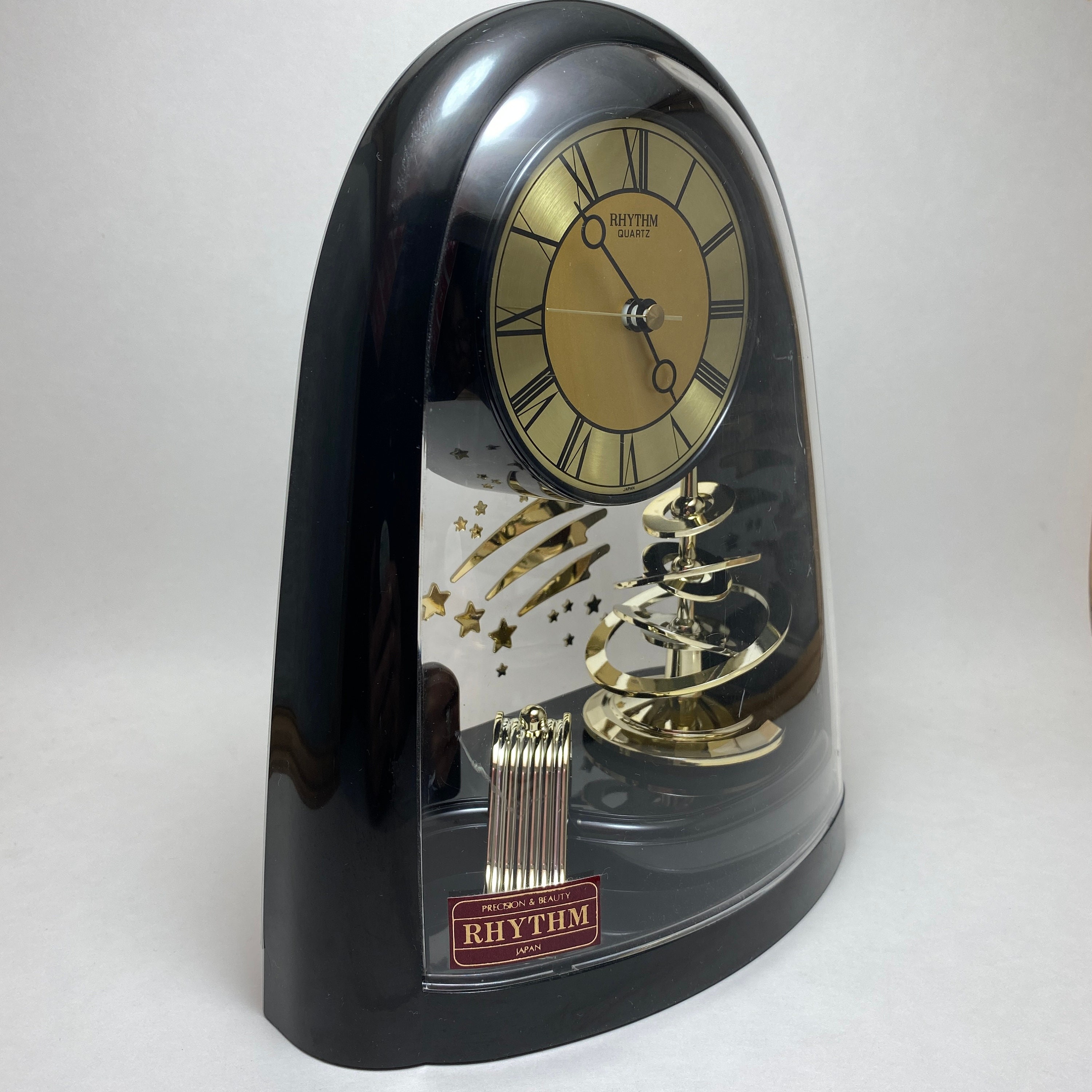 Vintage 1980s Rhythm Quartz Celestial Motion Clock With Spinning