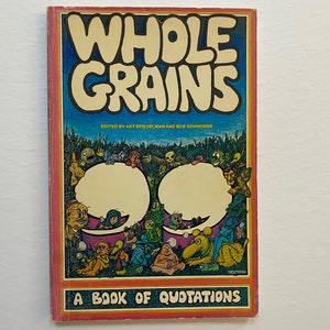 May include: A book titled "Whole Grains: A Book of Quotations" with a colourful cover featuring cartoon characters and speech bubbles. The book is edited by Art Spiegelman and Bob Schneider.
