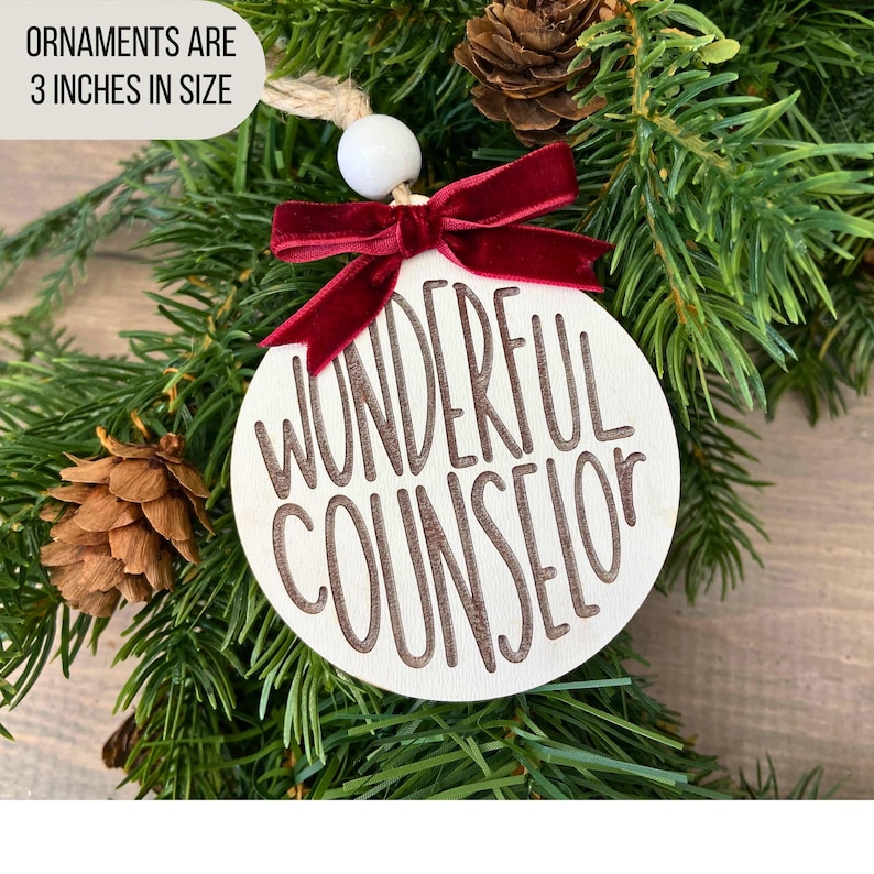 Each ornament is 3 inches in size. This ornament has a white bead, and red velvet ribbon.