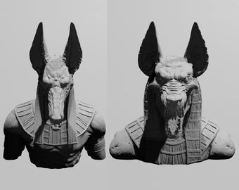 May include: Two grayscale busts of Anubis, the Egyptian god of the afterlife, are displayed. The sculptures feature the jackal-headed figure with detailed facial features, large ears, and a stylized collar. The busts are set against a plain background.