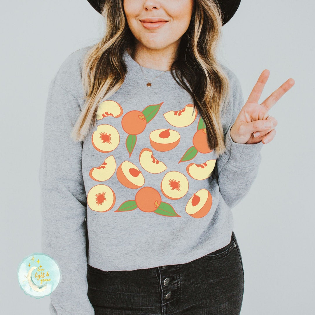 peach nike sweatshirt