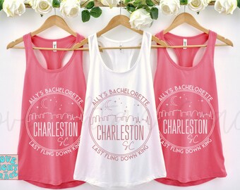 May include: Three pink and white tank tops with a white graphic design that says "Ally's Bachelorette Charleston SC Last Fling Down King" with a skyline and crescent moon.