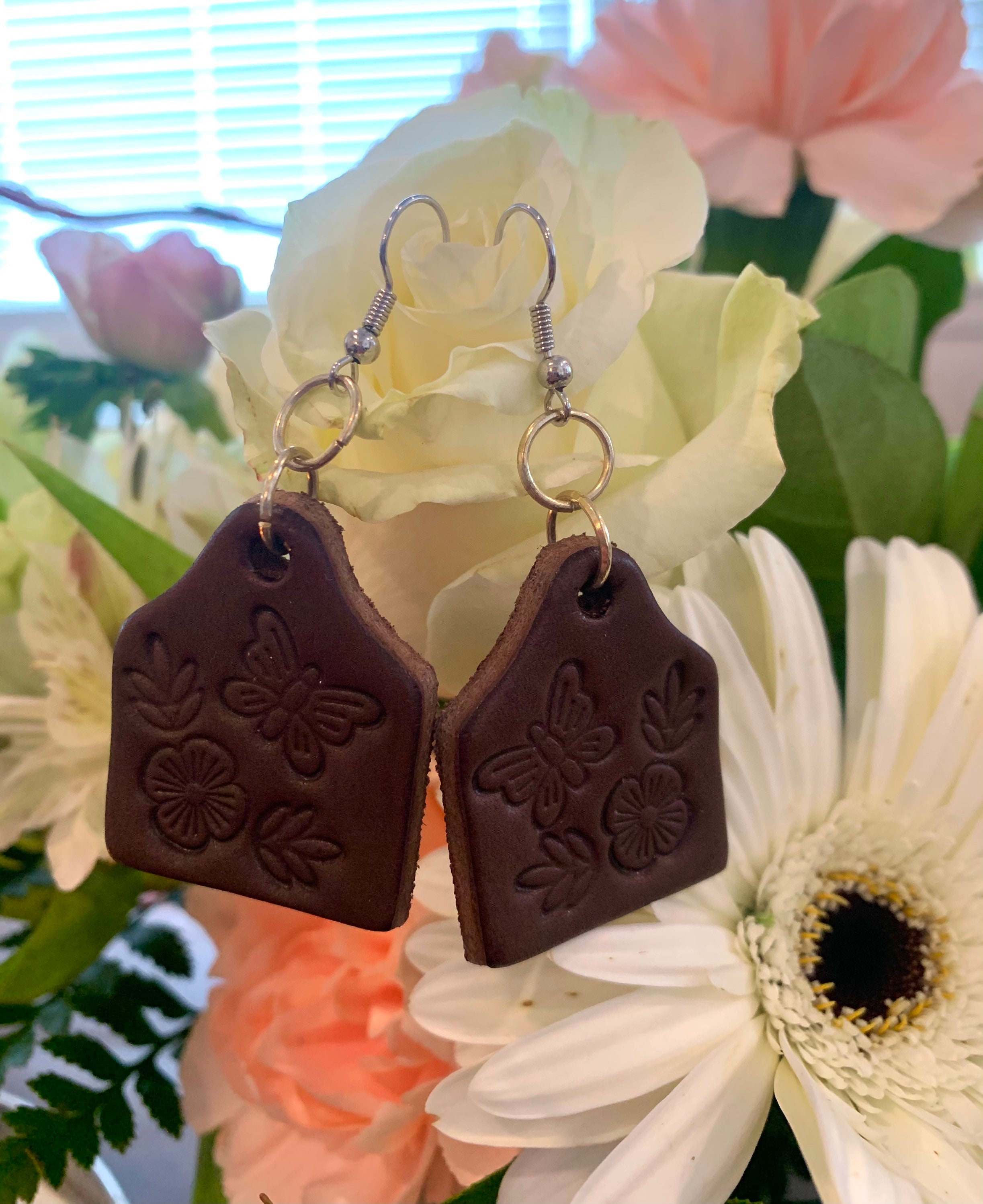 Leather stamped cow tag earrings Etsy