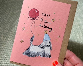 Oui ! C'est votre carte d'anniversaire pour chien