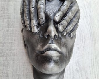 Eyes covered statue wall art sculpture painted in silver weathered,face with hands on eyes wall decoration home or office.