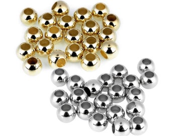 5 piece Gold and Silver plastic beads with a large hole