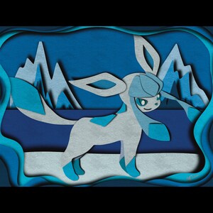 May include: A blue and white papercraft of a mythical creature with a long, pointed ear and a curled tail. The creature is standing on a snowy landscape with blue mountains in the background.