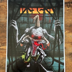 May include: A black and white illustration of a monstrous creature with a long, pointed head and sharp teeth. The creature is chained and appears to be trapped in a dark, brick room. The text "IGN" is visible in the background.