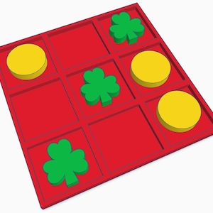 May include: A red tic-tac-toe game board with three yellow circles and three green shamrock shapes.