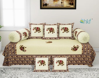 diwan cot round pillows