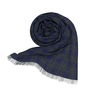 May include: A rolled-up navy blue and green plaid scarf with a fringed edge. The scarf is made of a soft material and features a classic tartan pattern. The scarf is a versatile accessory for any wardrobe.