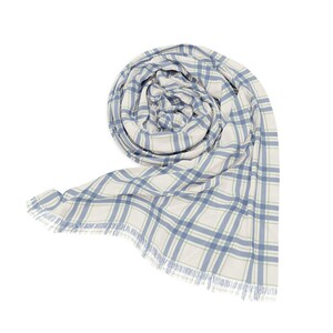 May include: A rolled-up, soft, blue and white plaid scarf with fringed edges. The scarf is made of a lightweight fabric and features a classic plaid pattern in shades of blue and white. The fringed edges add a touch of texture.