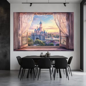 May include: A large framed canvas print depicts a picturesque view of a fairytale castle through an open window. The scene includes a carousel, trees, and a sunset sky. Soft, sheer curtains frame the window, adding a touch of elegance to the artwork.