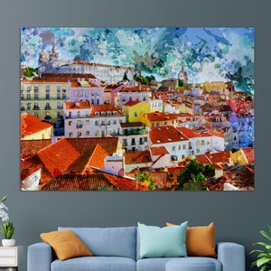 May include: A watercolor painting of a cityscape with colorful buildings and red tile roofs. The painting has a blue and white background with splashes of color.