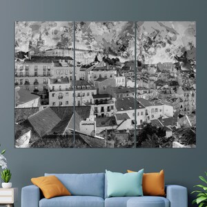 May include: A black and white watercolor painting of a cityscape with buildings and rooftops. The painting has a textured, abstract look.