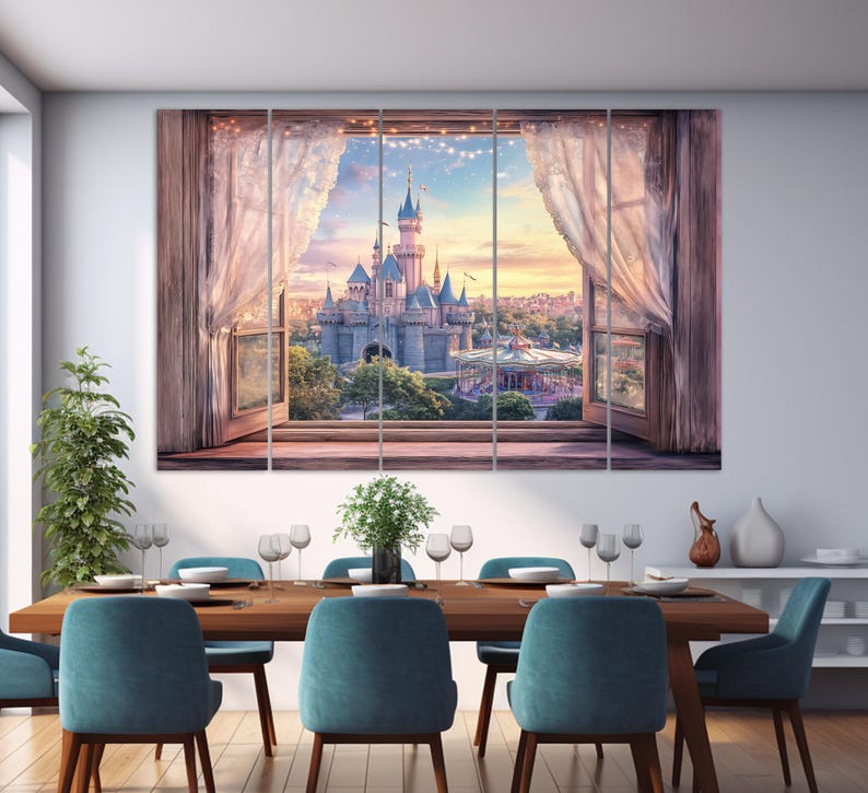 May include: A multi-panel canvas print depicting a fairytale castle scene viewed through a window with sheer curtains. The castle is a focal point, set against a sunset sky. The image is displayed above a dining table with blue chairs.