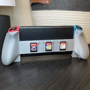 Comfort Grip Plus 5 Game Holder Built into the Back, Switch Handheld