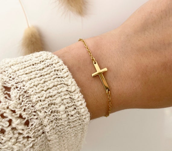 Cross pendant hotsell bracelet