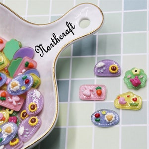 Cabochons de mouton fleurs | Cabochons carottes lapin | Cabochons oiseaux herbe | Cabochons nuages tournesol | Cabochons fleurs ours | Cabochons en résine