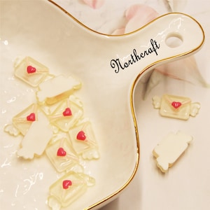 Duidelijke liefde envelop cabochons | Liefde envelop cabochons | Vleugel envelop cabochons | Envelop cabochons | Minnaar cabochons | Paar cabochon | Hars