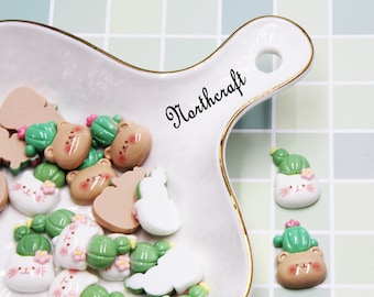 Hars cabochons: dieren- en plantenmotieven (20 x 28 mm)