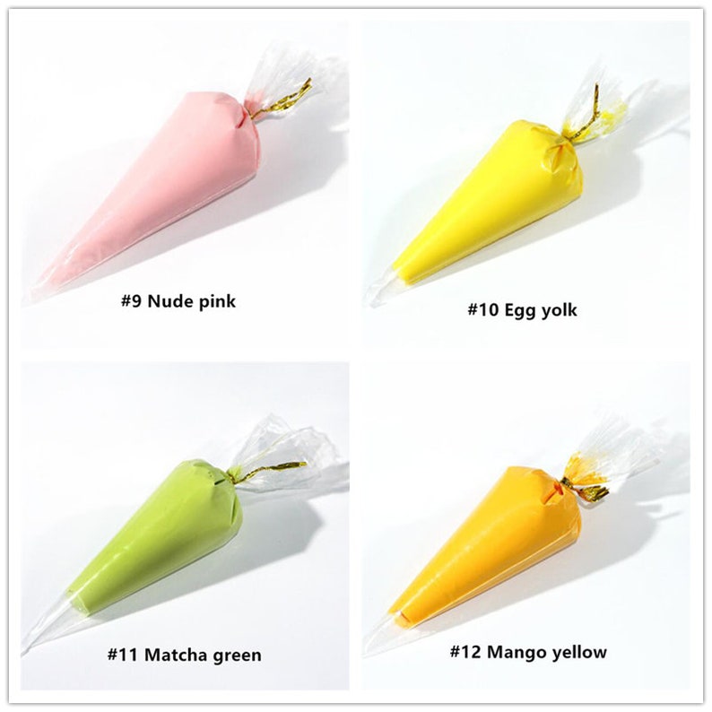 May include: Four piping bags filled with different coloured frosting. The bags are labelled with numbers and colour names: #9 Nude pink, #10 Egg yolk, #11 Matcha green, #12 Mango yellow.