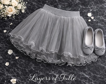 Gonna tutù da ballo in tulle grigio per bambina, leggera e adatta per le lezioni di danza.