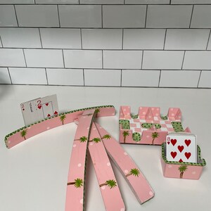 Hand painted 6 pc canasta set includes 1 revolving tray, 2 deck card holder & 4 card racks ( rack holds 13 cards )