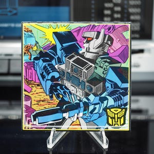 Posavasos de cartón clásico Transformers Fortress Maximus - Arte de portada - Marzo de 1988, Transformers, vol. 1, n.º 38 - 1/3