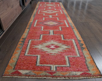 ピンクオレンジのトルコ製ランナーラグ：ヴィンテージウールの