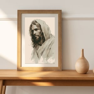 Può includere: Un disegno in bianco e nero incorniciato di Gesù Cristo. Il disegno è in uno stile semplice e mostra il viso e le spalle di Gesù. Indossa una tunica e ha i capelli lunghi e la barba.