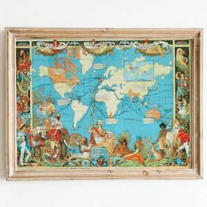 May include: Framed vintage world map print with a light blue ocean and tan continents. The map features illustrations of people and animals around the edges, with the words "Federation" and "World" visible.