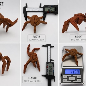 May include: A rocky brown, stylized spider sculpture. The spider is 3.62 inches wide, 1.97 inches tall, and 4.83 inches long. It weighs 0.49 oz. The product size is approximate.