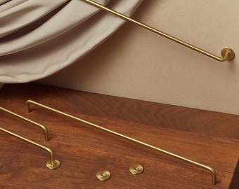 aged brass towel bar