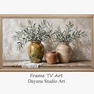 May include: A framed painting shows three vases with olive branches on a wooden surface. The vases are in shades of brown and green. The painting has a neutral background and the text "Frame TV Art Dayana Studio Art".
