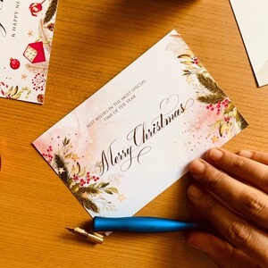 Merry Christmas and New Year Cards, Handwritten with Calligraphy. Add a personal touch to the clients order. Pack of 20 and 50 Floral White