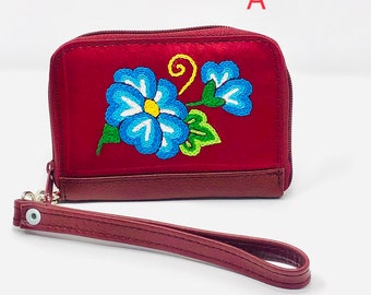 Leather purse with embroidery application with floral desings