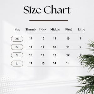 May include: A size chart with the title "Size Chart" in a bold, black font. The chart lists sizes XS, S, M, and L, with corresponding measurements for thumb, index, middle, ring, and little fingers. The background is a light beige.