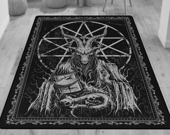 May include: Black and white rug with a graphic design of a goat-like figure with horns, holding a book, surrounded by a star and lightning bolts. The rug has a black border with a decorative pattern.