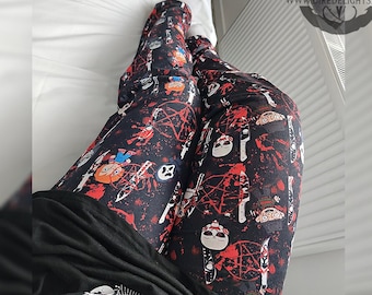May include: Black leggings with a red, white, and black print of horror movie characters and knives. The print includes Freddy Krueger, Jason Voorhees, Chucky, and Michael Myers. The text "Dire Delights" and "www.diredelights.com" is visible in the upper right corner of the image.