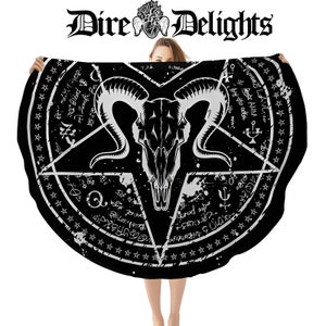 May include: Black and white circular tapestry with a pentagram and a goat skull in the center. The pentagram is surrounded by a circle of text and stars.