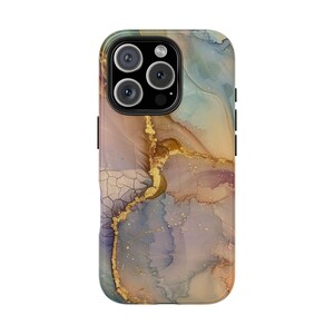 May include: A phone case with a marble design featuring shades of brown, blue, and gold. The case has a raised camera bump with a black outline.
