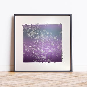 May include: Framed art print featuring a gradient background of purple and teal, overlaid with a scattering of white geometric triangles. The artwork is encased in a black frame, suitable for wall decor.