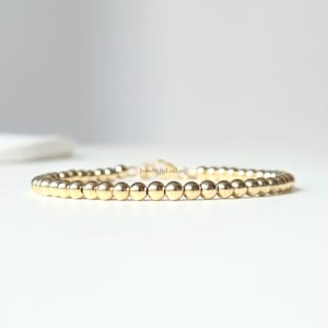 14k goldfilled kralen armband, 4mm kralen, gouden kralen armband, basis armband, waterproof, elastische gouden armband, op maat gemaakt