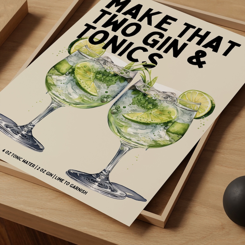 May include: A watercolor illustration of two gin and tonics with lime wedges and sprigs of rosemary. The text "MAKE THAT TWO GIN & TONICS" is at the top of the image. The text "4 OZ TONIC WATER | 2 OZ GIN | LIME TO GARNISH" is at the bottom of the image.