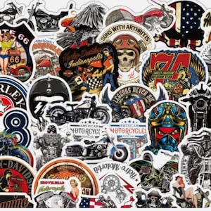 May include: A collection of motorcycle-themed stickers with various designs. The stickers feature motorcycles, skulls, American flags, and retro pin-up girl illustrations. Some stickers include text like "Route 66" and "Harley-Davidson".